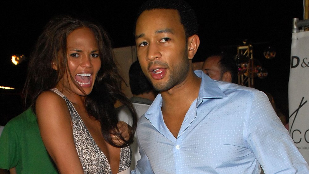 Chrissy Teigen e John Legend goofing intorno