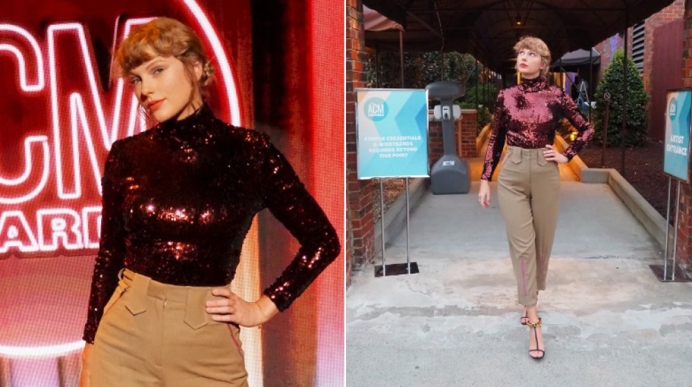 Taylor Swift in top con paillettes rosso e pantaloni color kaki