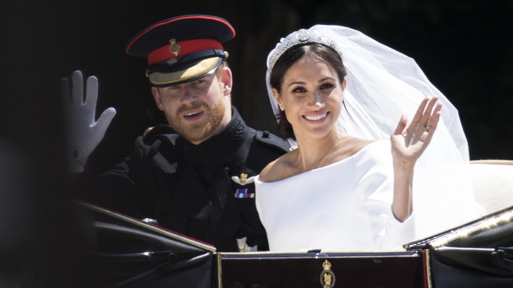 Il principe Harry e Meghan Markle in carrozza il giorno del loro matrimonio nel 2018