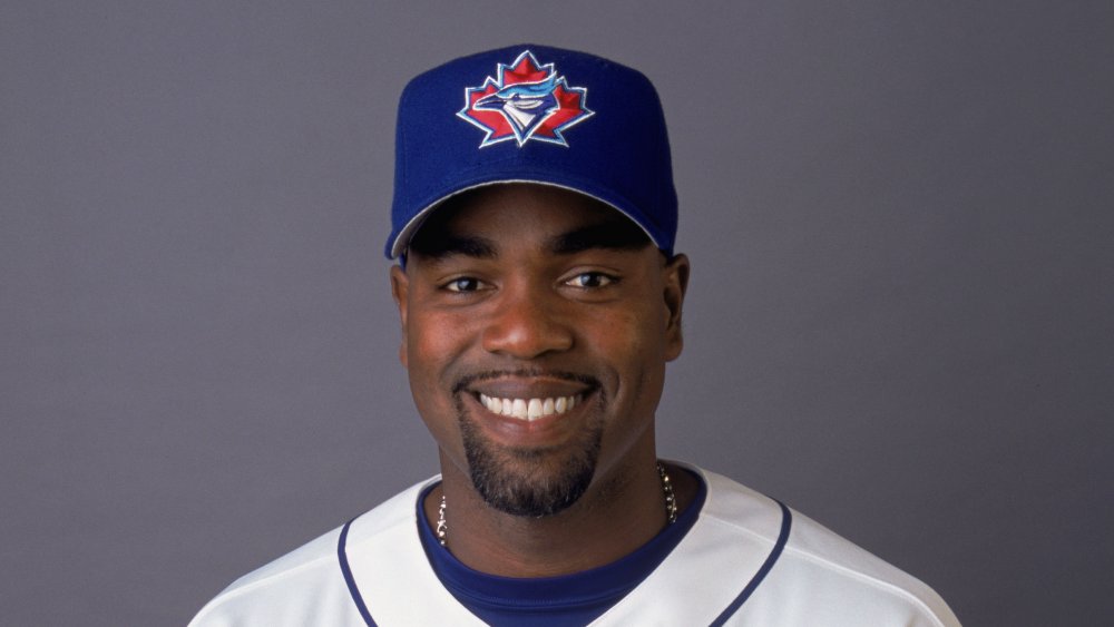 Carlos Delgado con la maglia e il cappello dei Blue Jays sorridenti