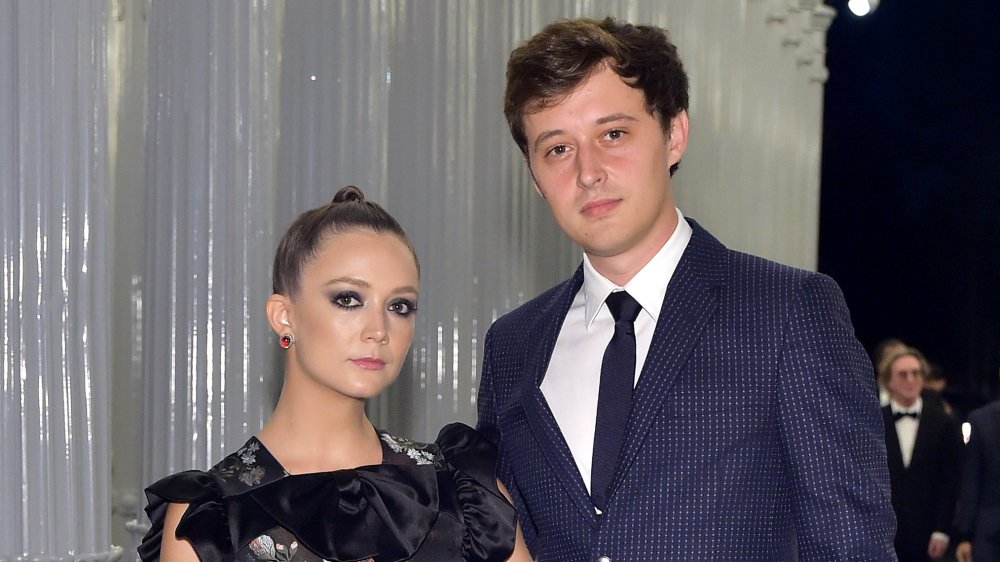 Billie Lourd and Austen Rydell staring at camera