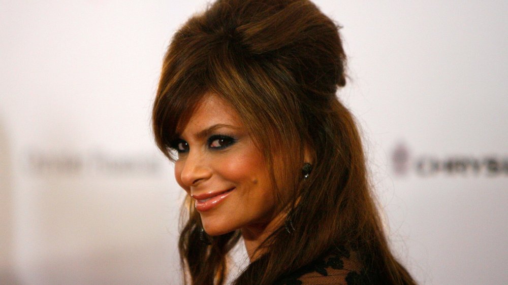 Paula Abdul smiling over her shoulder