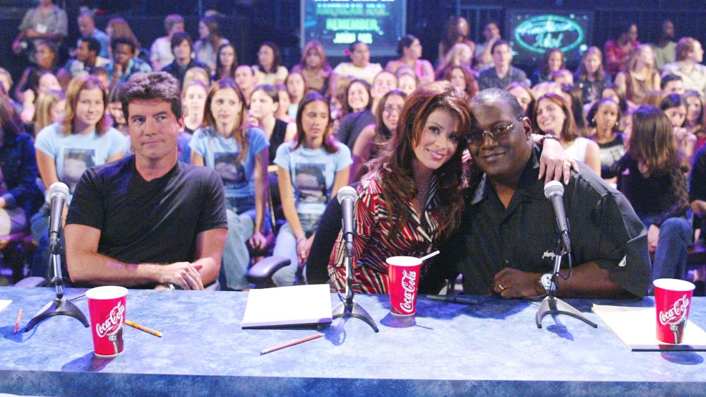 Simon Cowell, Paula Abdul, and Randy Jackson at the judges' table on American Idol