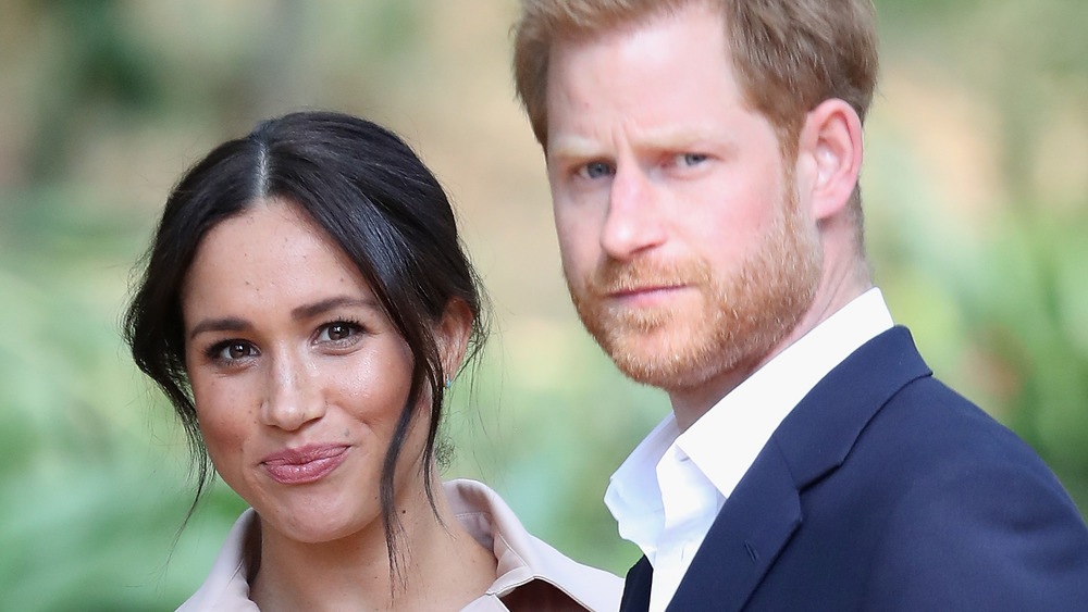 Meghan Markle e il principe Harry posano per la telecamera