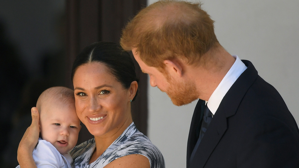 Meghan Markle con suo figlio Archie e il principe Harry