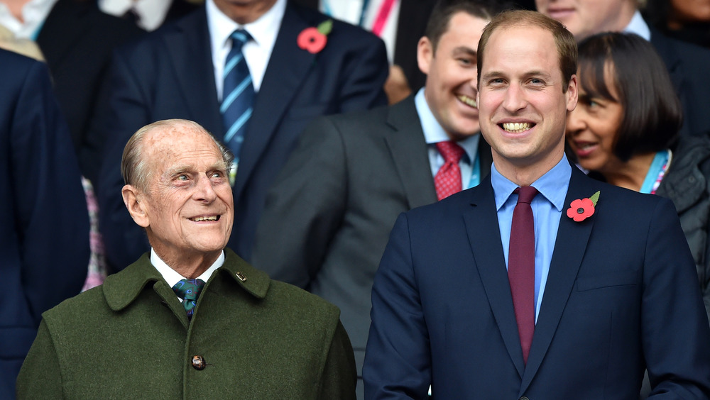 Il principe Filippo e il principe William condividono una risata a un evento del 2015