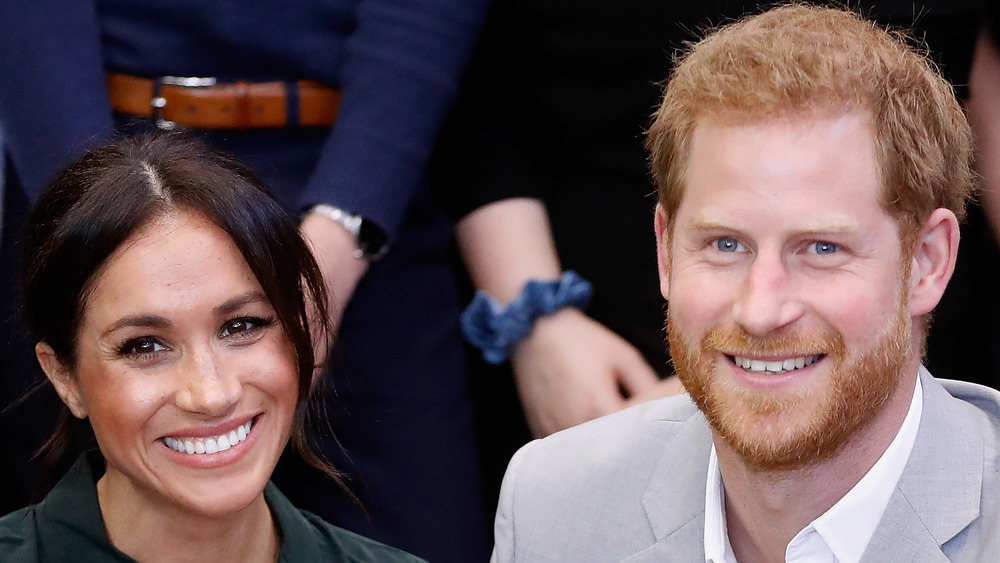 Meghan Markle e il principe Harry sorridono