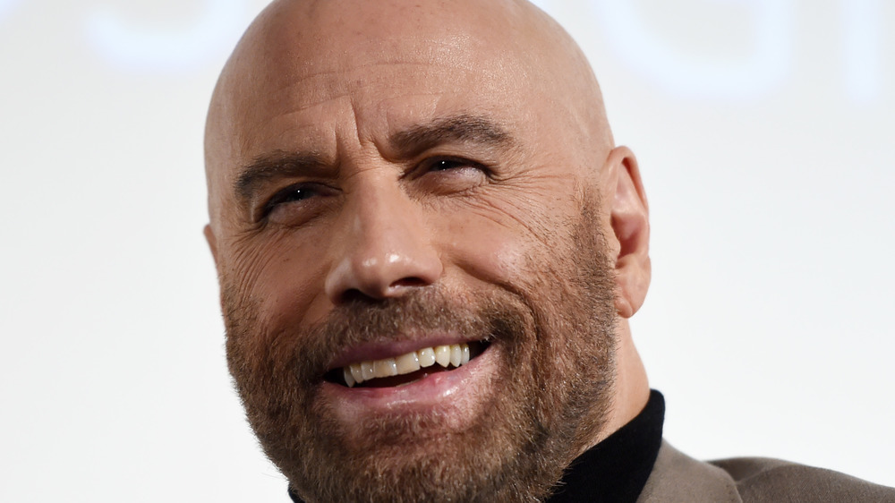 John Travolta sorride per la telecamera