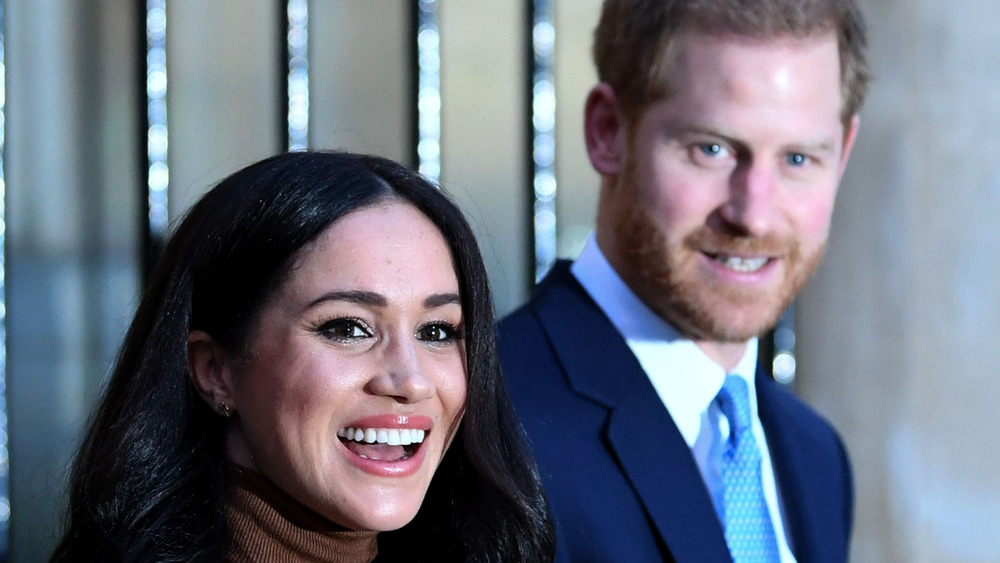 Meghan Markle e il principe Harry sorridono