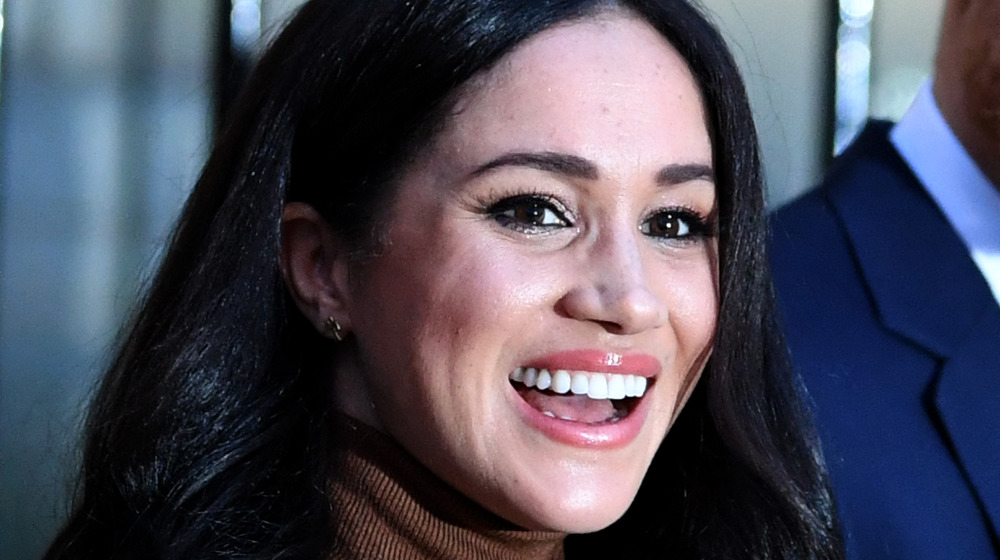 Meghan Markle e il principe Harry salutano i fan