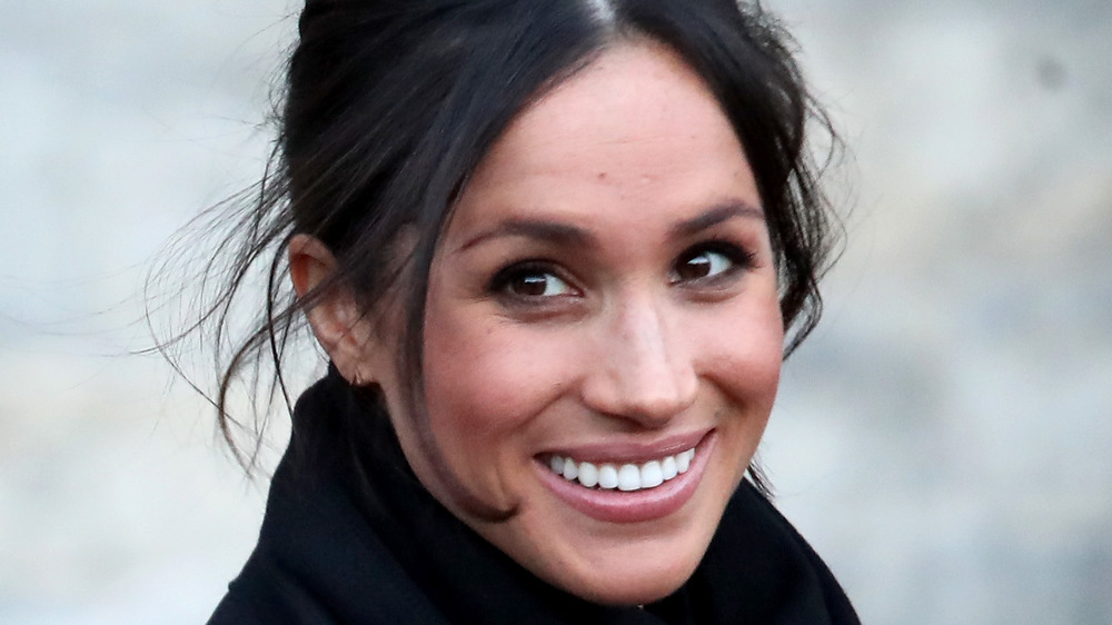 Meghan Markle sorride per le telecamere