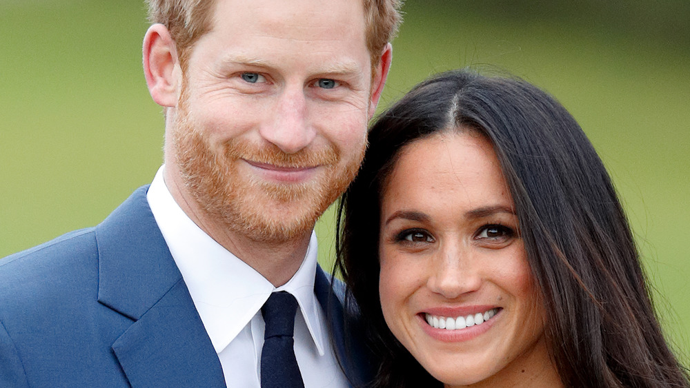 Meghan Markle e il principe Harry sorridono