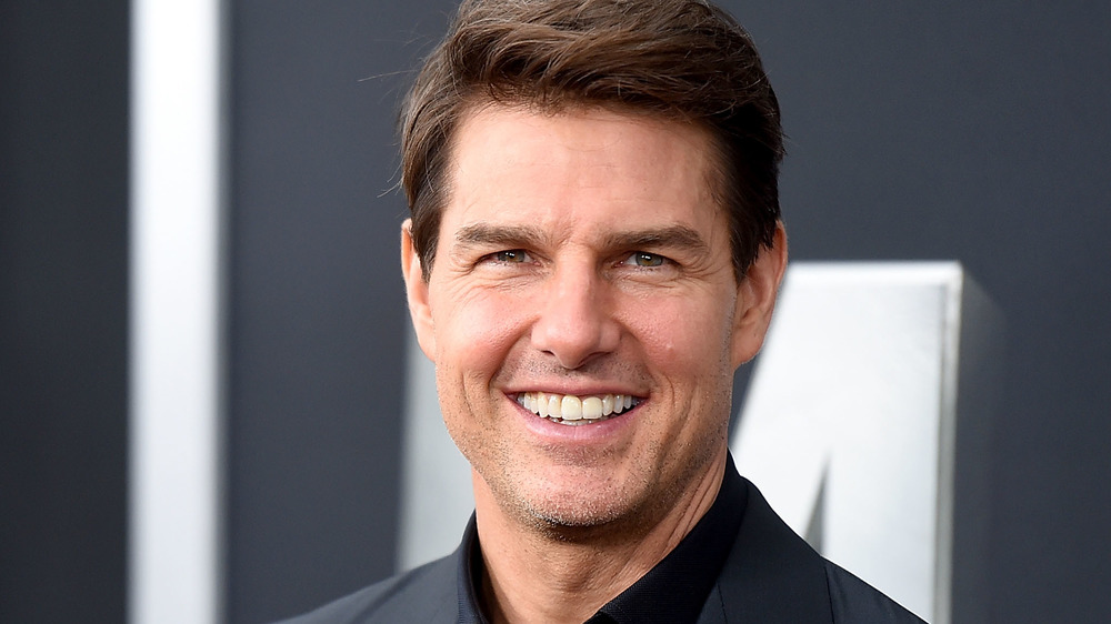Tom Cruise sorride