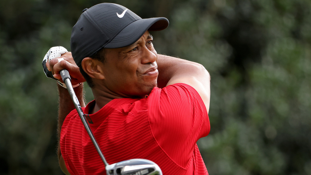 Tiger Woods giocare a golf