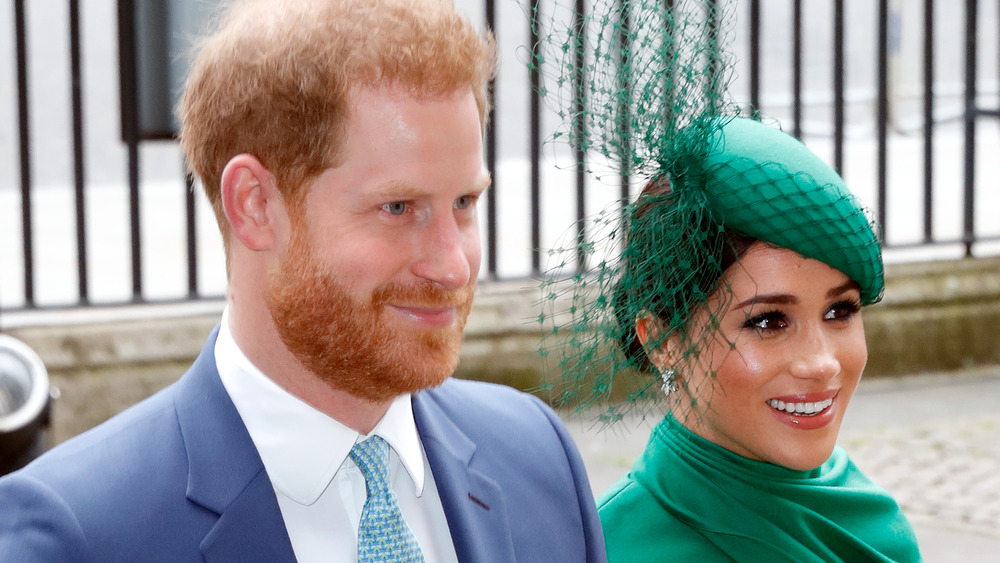 Meghan e il principe Harry sorridono