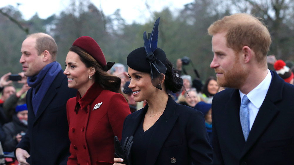 Il principe William con Kate Middleton, Meghan Markle e il principe Harry a un evento