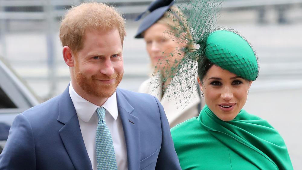 Il principe Harry e Meghan Markle durante un'apparizione pubblica