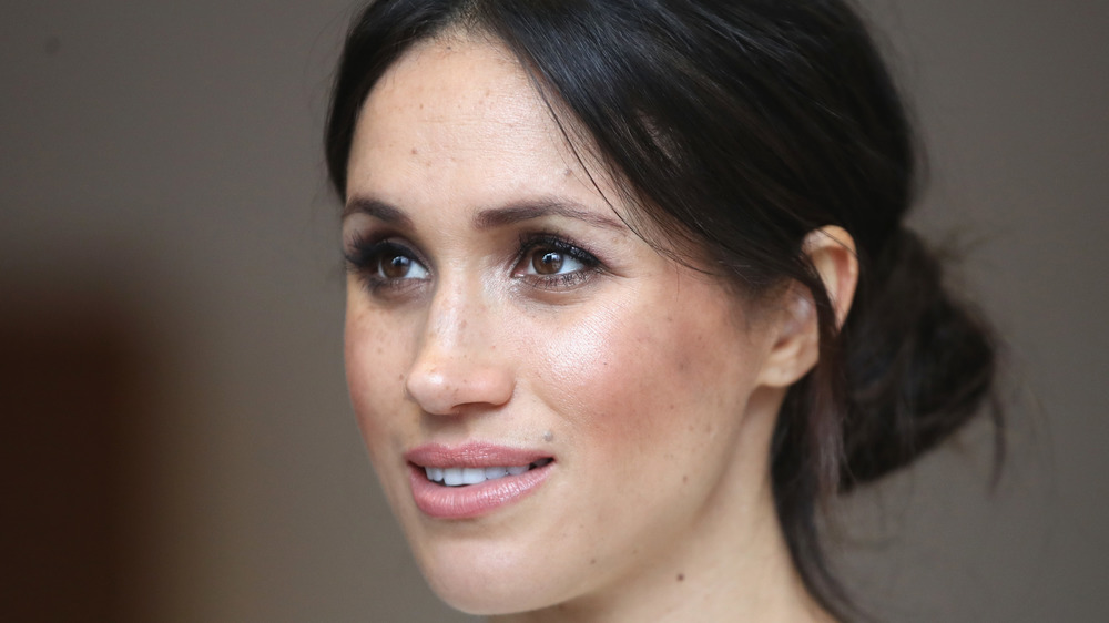 Meghan Markle sorride