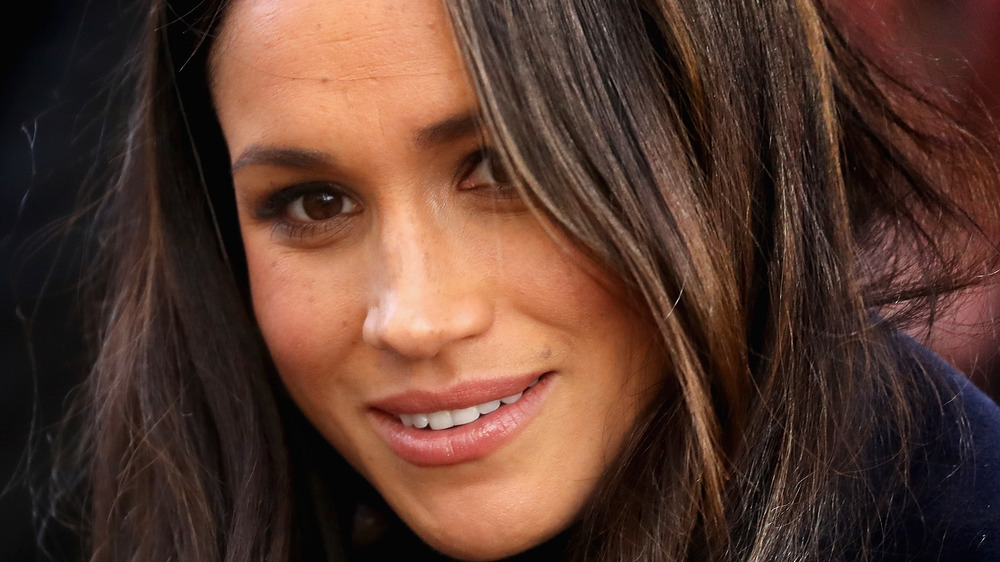 Meghan Markle sorride