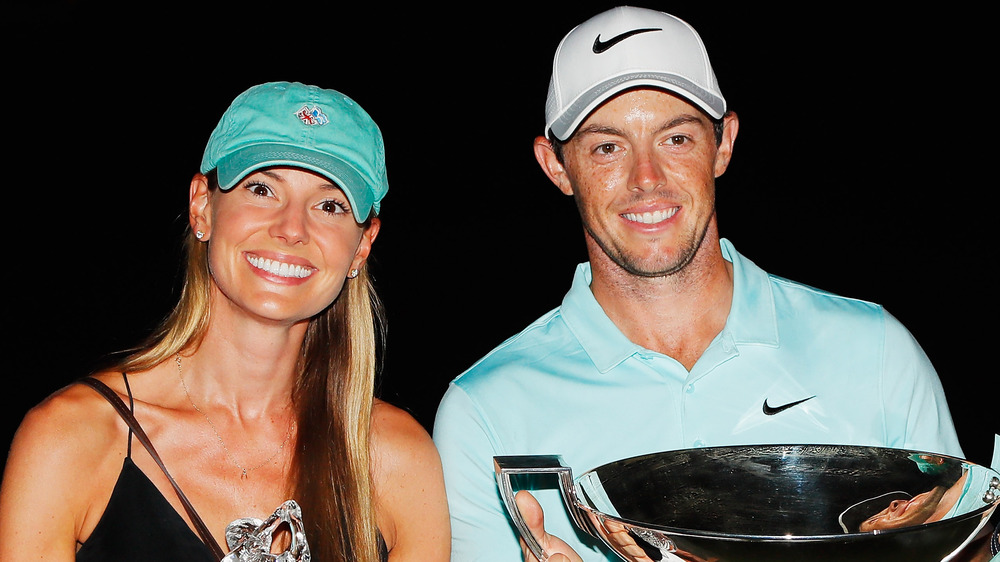 Erica Stoll e Rory McIlroy sorridono