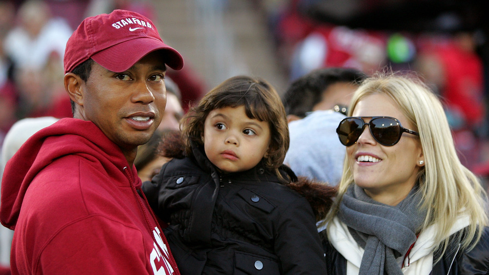 Tiger Woods con la sua ex moglie e il figlio