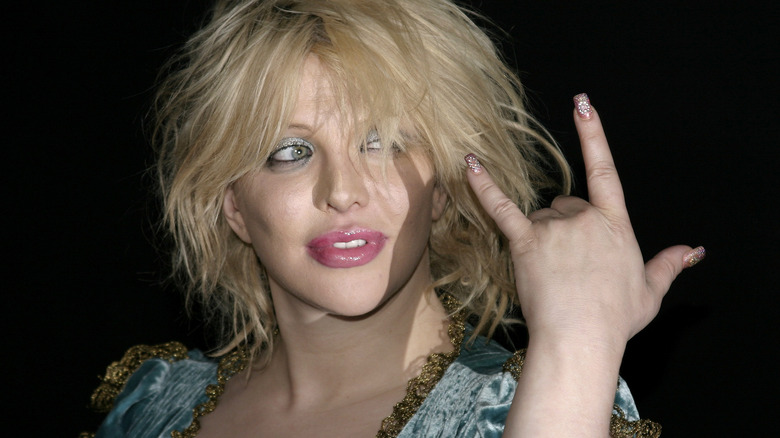 Courtney Love rock and roll segno 