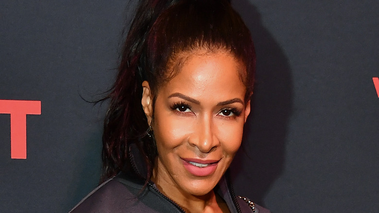 Shereé Whitfield sorride