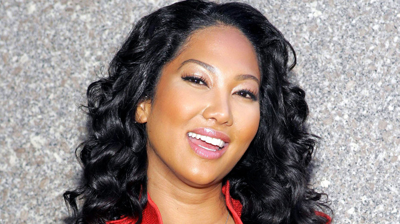 Kimora Lee Simmons sorride