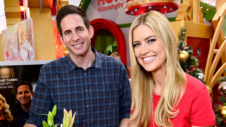 Tarek El Moussa e Christina Haack sorridono