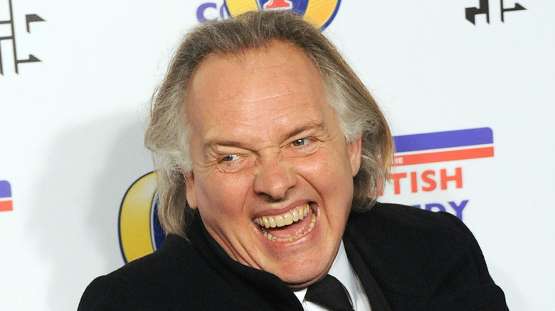 Rik Mayall che ride