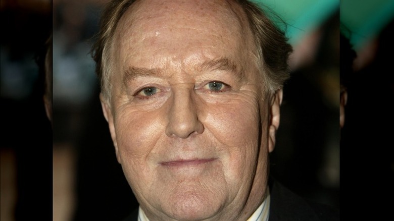 Robert Hardy sorride