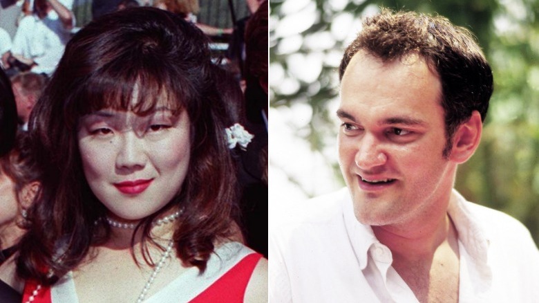 Margaret Cho sorride, Quentin Tarantino guarda di lato