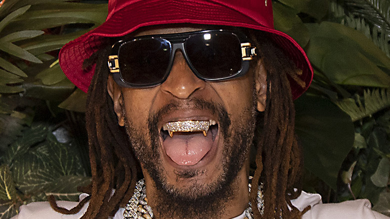 Lil Jon cappello rosso diamante grillz zanne d'oro