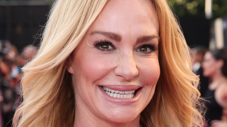 Taylor Armstrong sorride