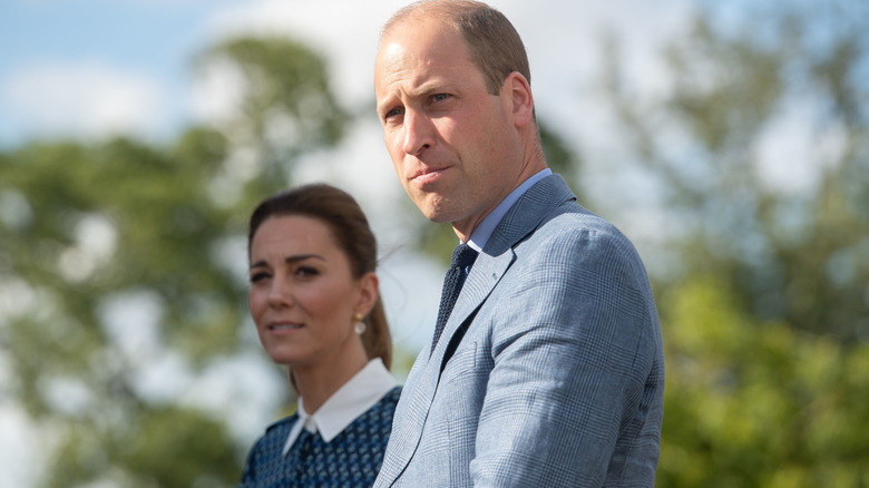 Il principe William e Kate Middleton accigliati 