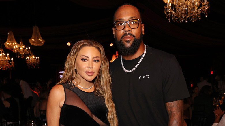 Larsa Pippen e Marcus Jordan in posa