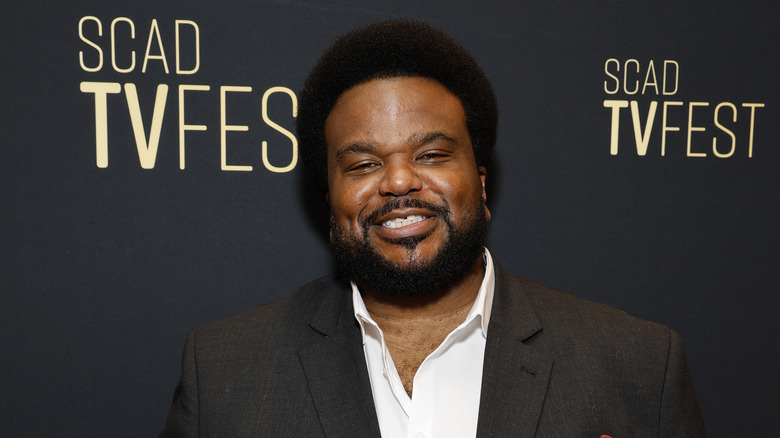 Craig Robinson che sorride