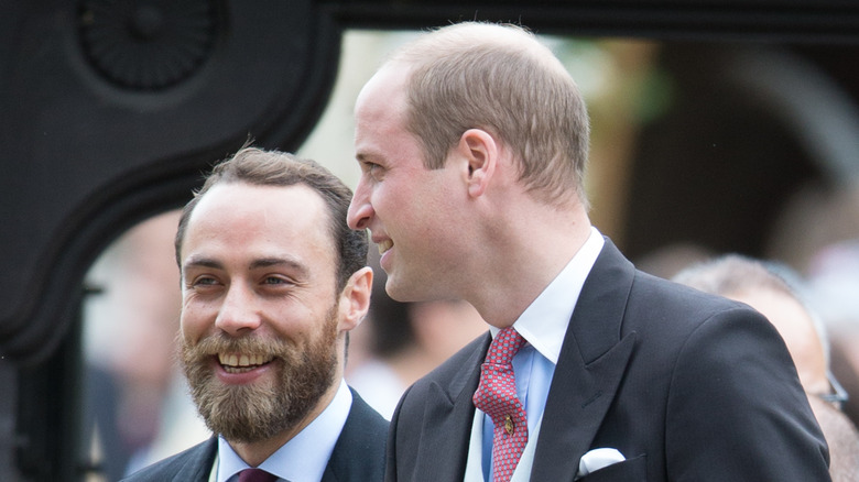 Il principe William e James Middleton ridono