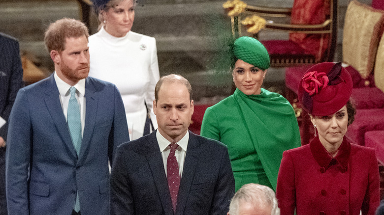 Il principe Harry, il principe William, Meghan Markle e Kate Middleton