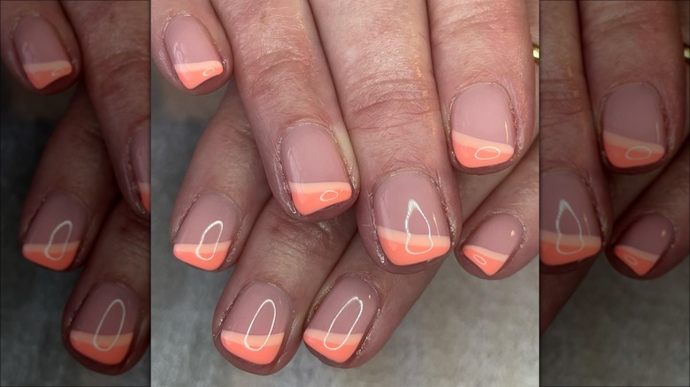 Manicure francese con angoli arancio-pesca