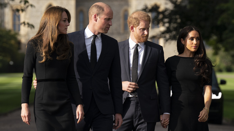 Kate Middleton, il principe William, il principe Harry e Meghan Markle