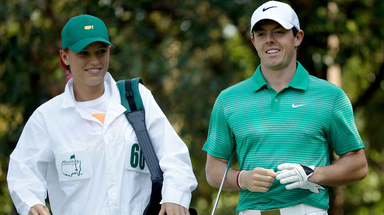 Caroline Wozniacki e Rory McIlroy sorridono