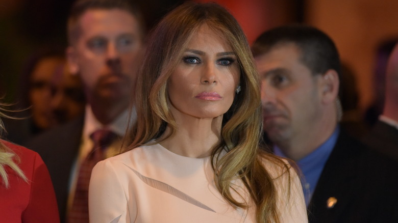 Melania e Donald Trump in abito rosa