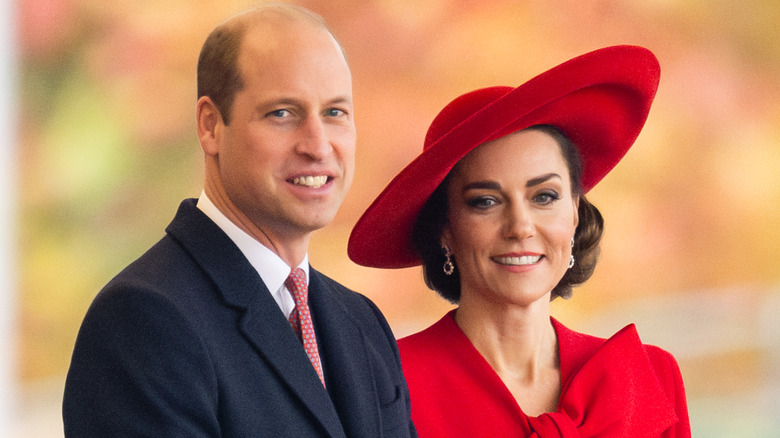 Il principe William e Kate Middleton sorridono