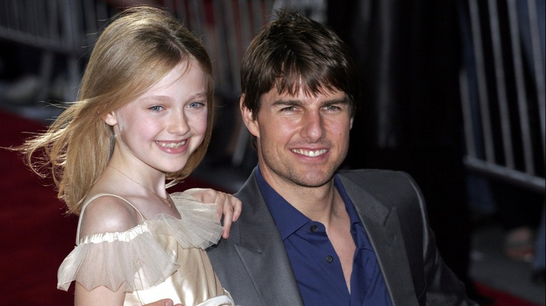 Tom Cruise e la giovane Dakota Fanning tutti sorrisi