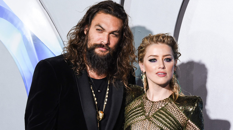 Amber Heard Jason Momoa posa sul red carpet