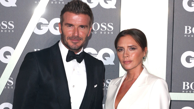 David Beckham e Victoria Beckham, entrambi sorridenti