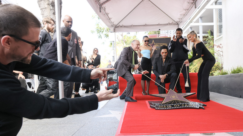 Tatum fotografa la star di Hollywood di Lenny Kravitz