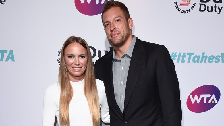 David Lee posa con Caroline Wozniacki