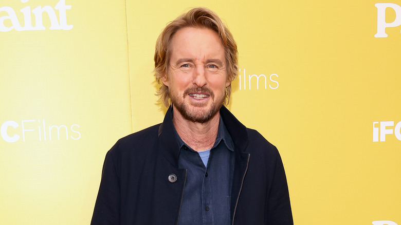 Owen Wilson posa per una fotografia sul red carpet